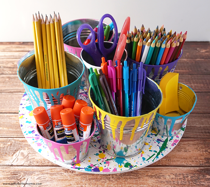 lazy susan with pencils, scissors, pens and other school supplies