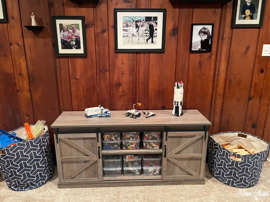 TV stand repurposed as a DIY living room lego storage cabinet