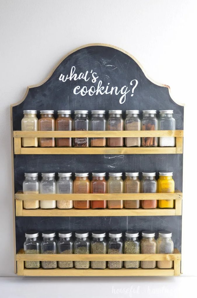 wooden wall mounted rack with spices
