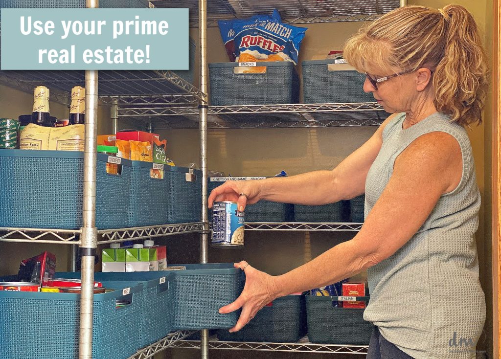 woman putting cans in a basket in a pantry with the words, use your prime real estate in a blue box