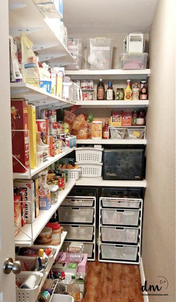 a skinny and small kitchen pantry that is neat and organized