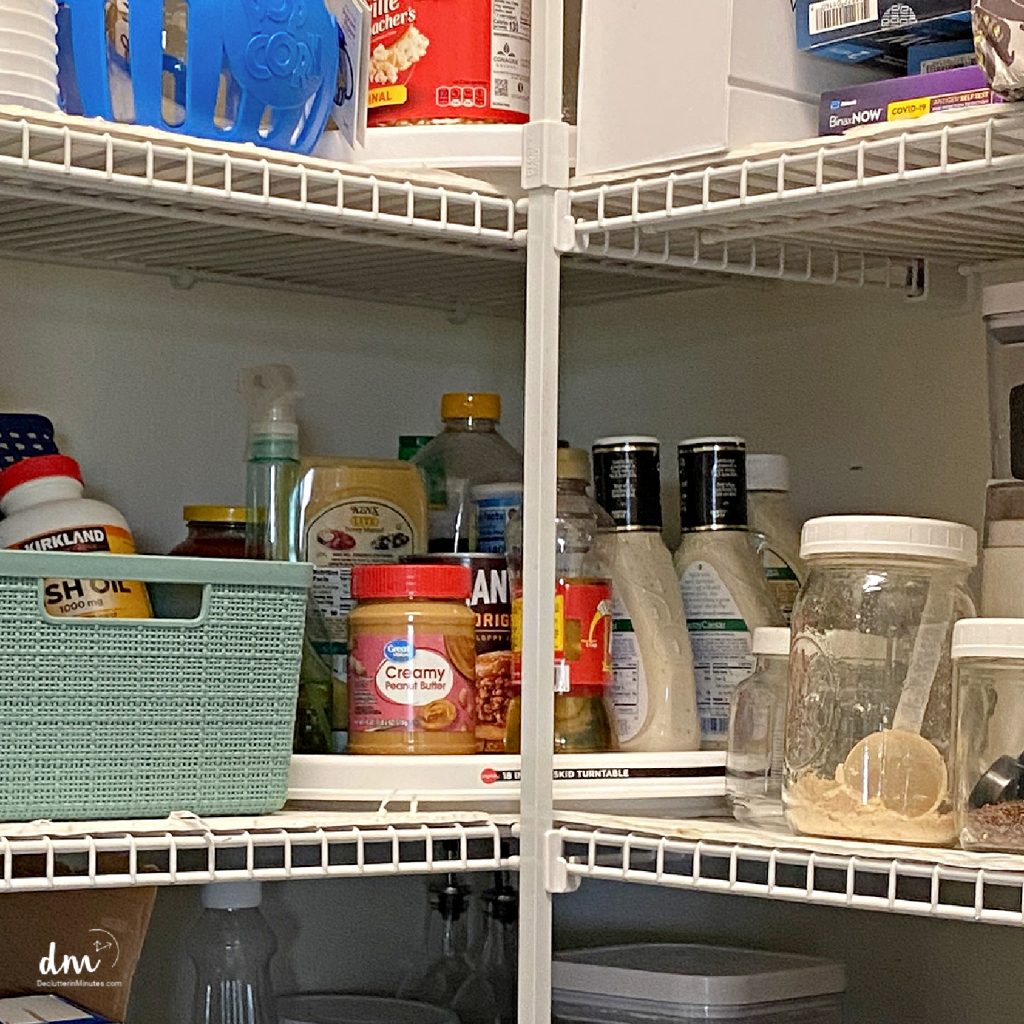 a kitchen pantry with lazy susans in the corner