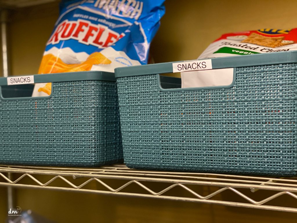 two basked in a pantry labeled snacks