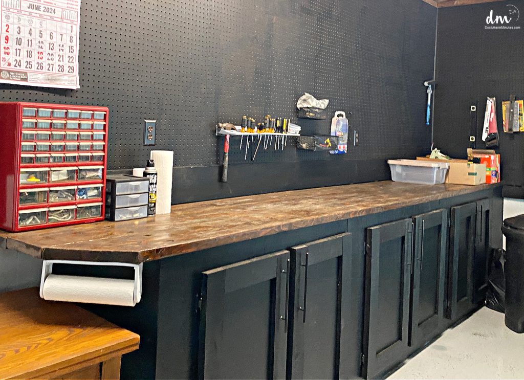 a black workbench in a clean garage