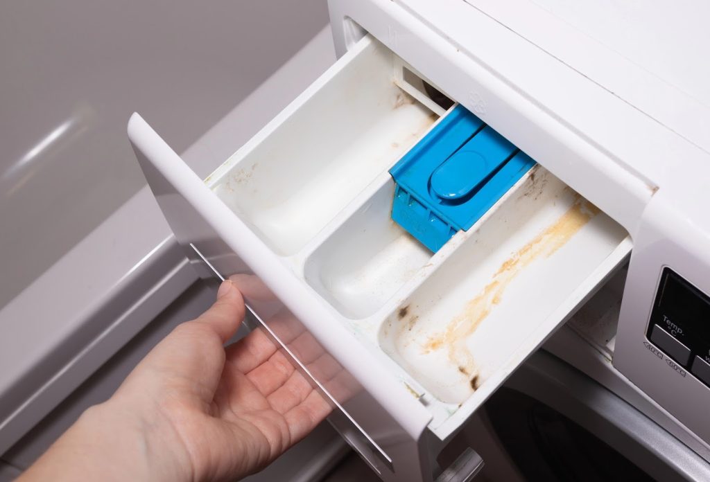 a dirty detergent drawer of a washing machine