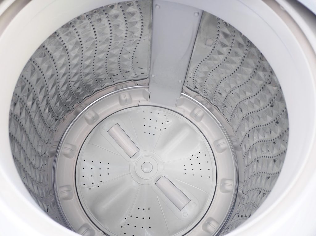 the inside view of a top load washing machine