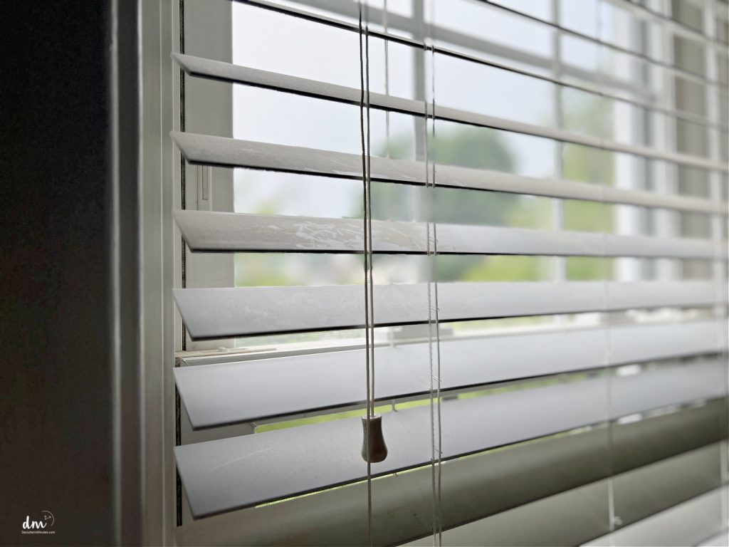 dust on a white venetian blind