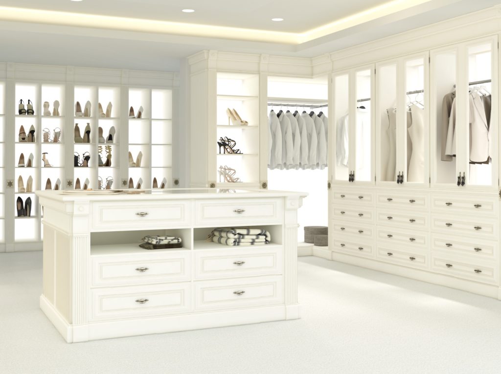 beautiful walk in closet with organized clothes and shoes