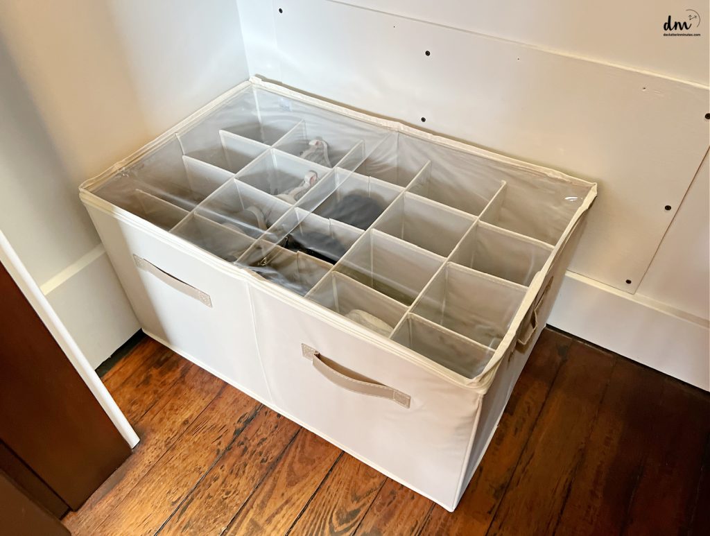 shoe organizer on the floor of a closet