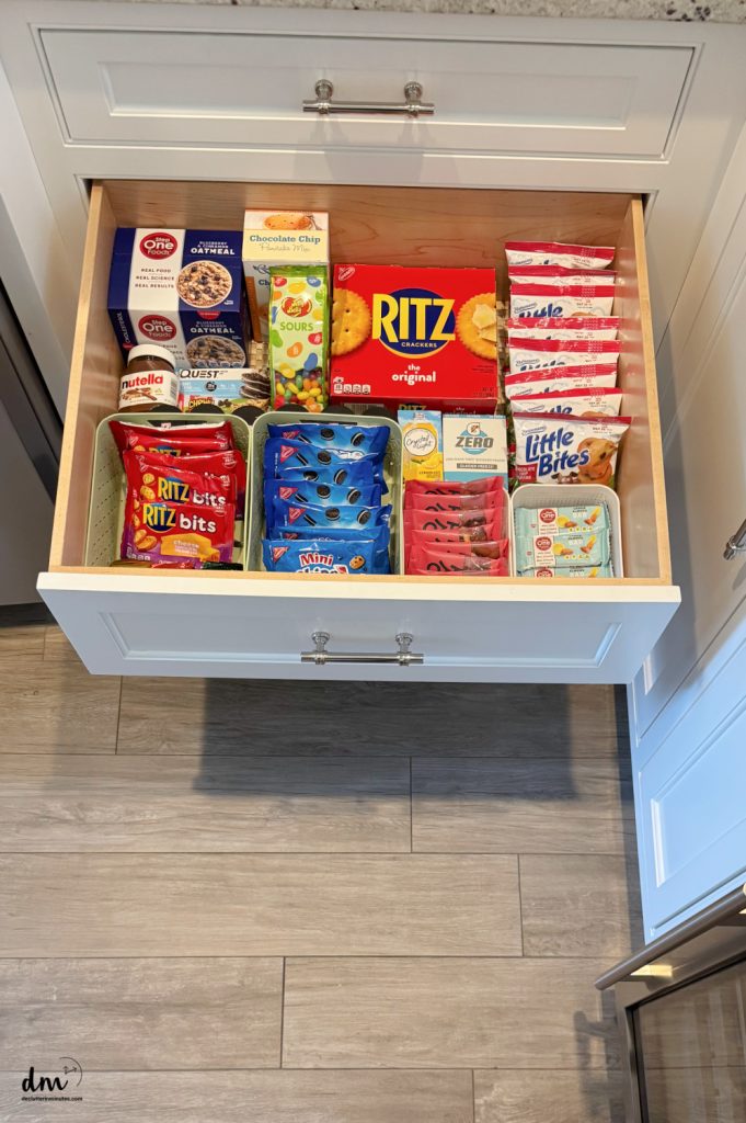 snack drawer fill with small portioned snacks for kids