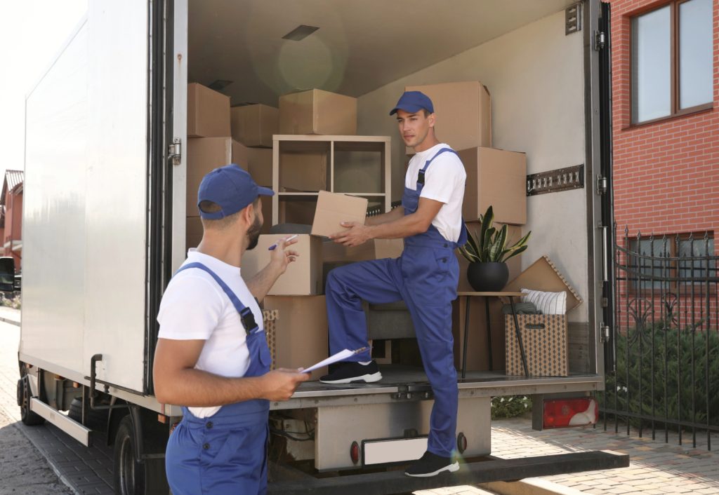 movers filling a moving truck up from a home