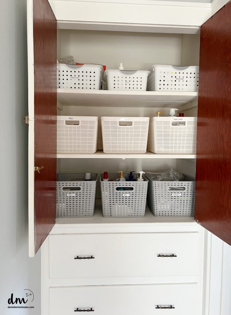 a photo of baskets in a linen closet