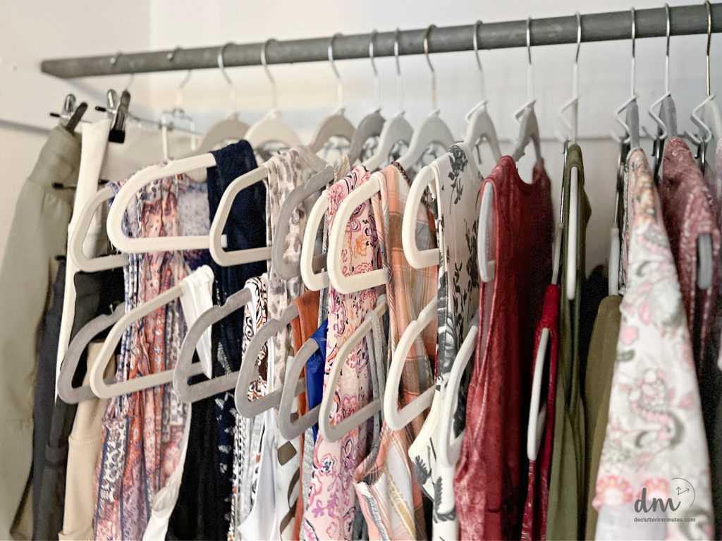 close up of clothes in a neat and downsized closet