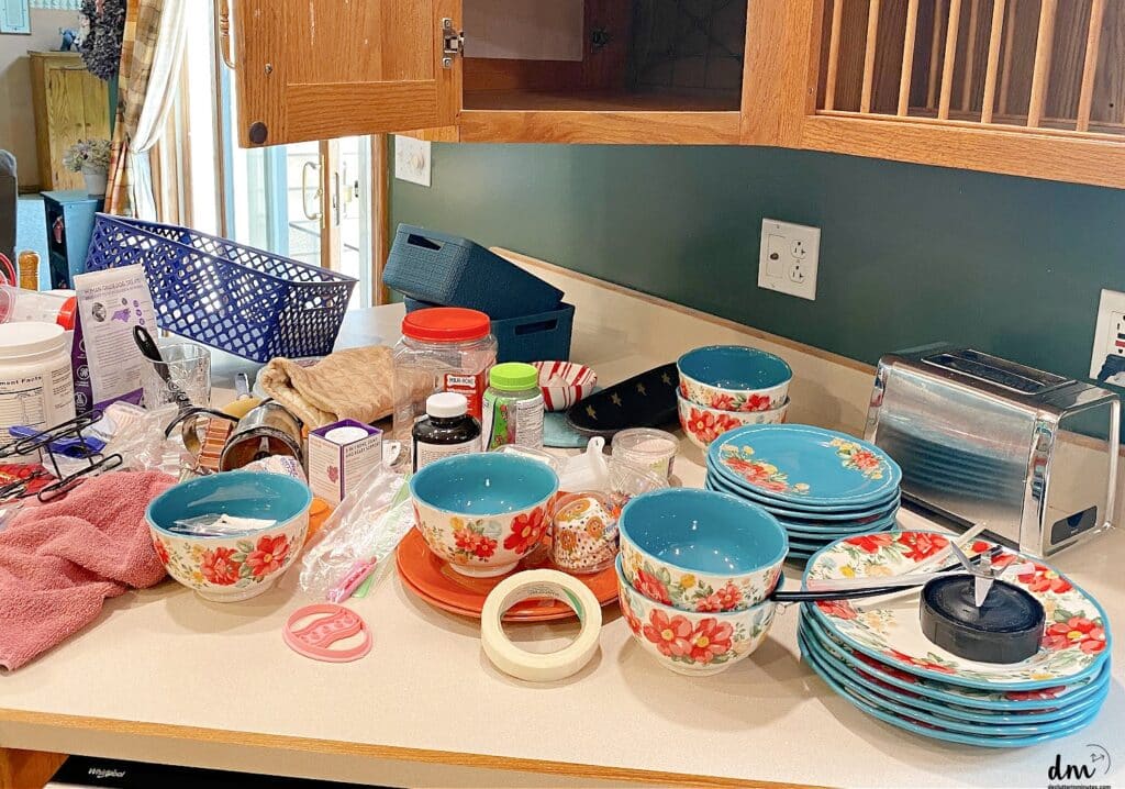 clutter all over a kitchen counter