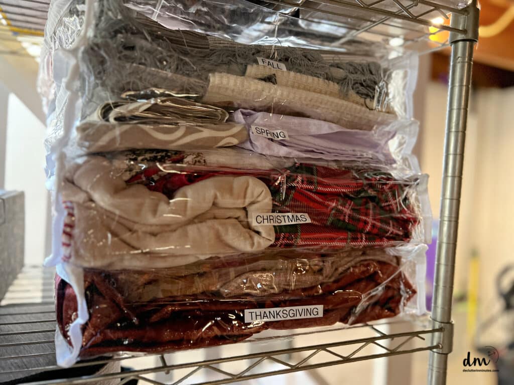 linens in clear zipper bag on a shelf
